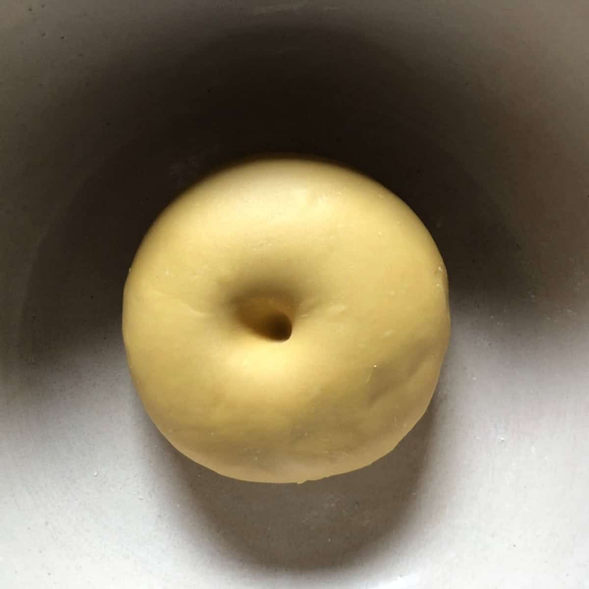 The indentation staying in the semolina and 00 flour pasta dough indicating the gluten is fully relaxed and ready to roll, pasta dough recipe semolina and 00.