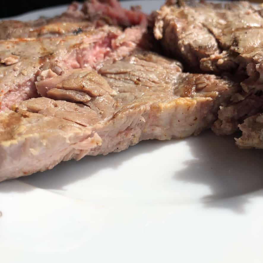closeup of overcooked beef steak