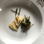 garlic and rosemary separated from the butter