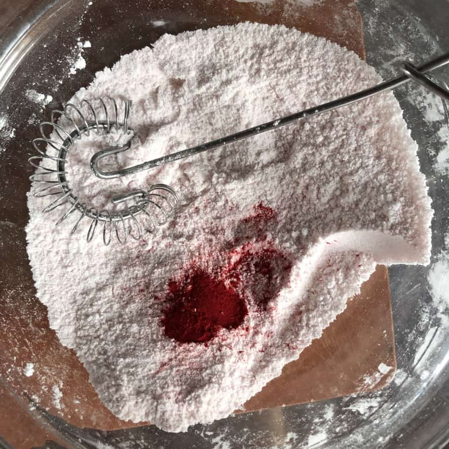 whisking together the powdered sugar and corn starch