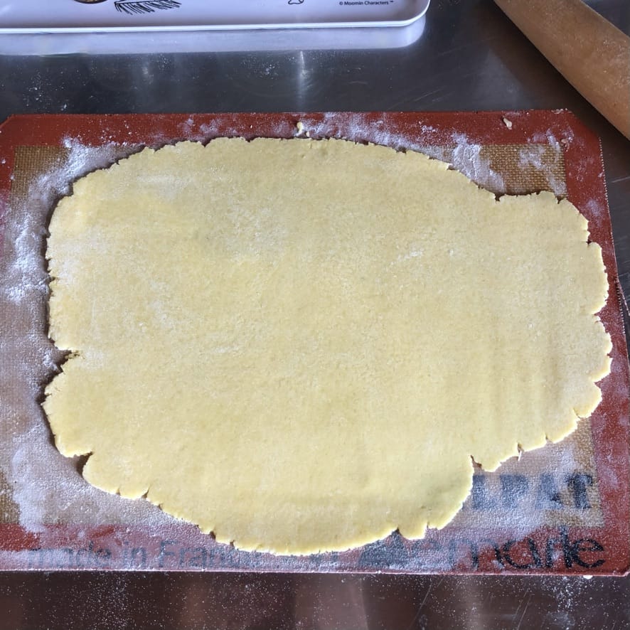 a perfectly rolled out short crust pastry dough into a rectangle