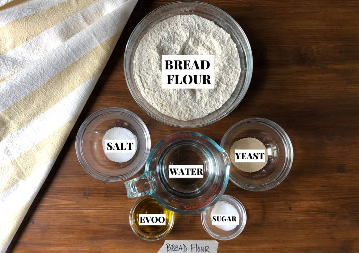 Ingredients needed to make the best bread Flour pizza dough (bread flour, instant yeast, sugar, salt, extra virgin olive oil, and water).