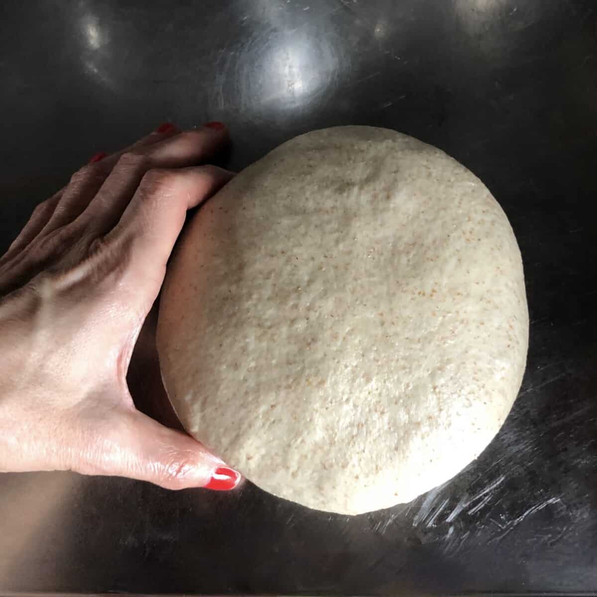 a large dough ball ready to be portioned.