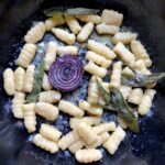 Boiled gnocchi tossed in a sage and extra virgin olive oil sauce and sprinkled with grated Grana Padano cheese creating a very light gnocchi sauce.