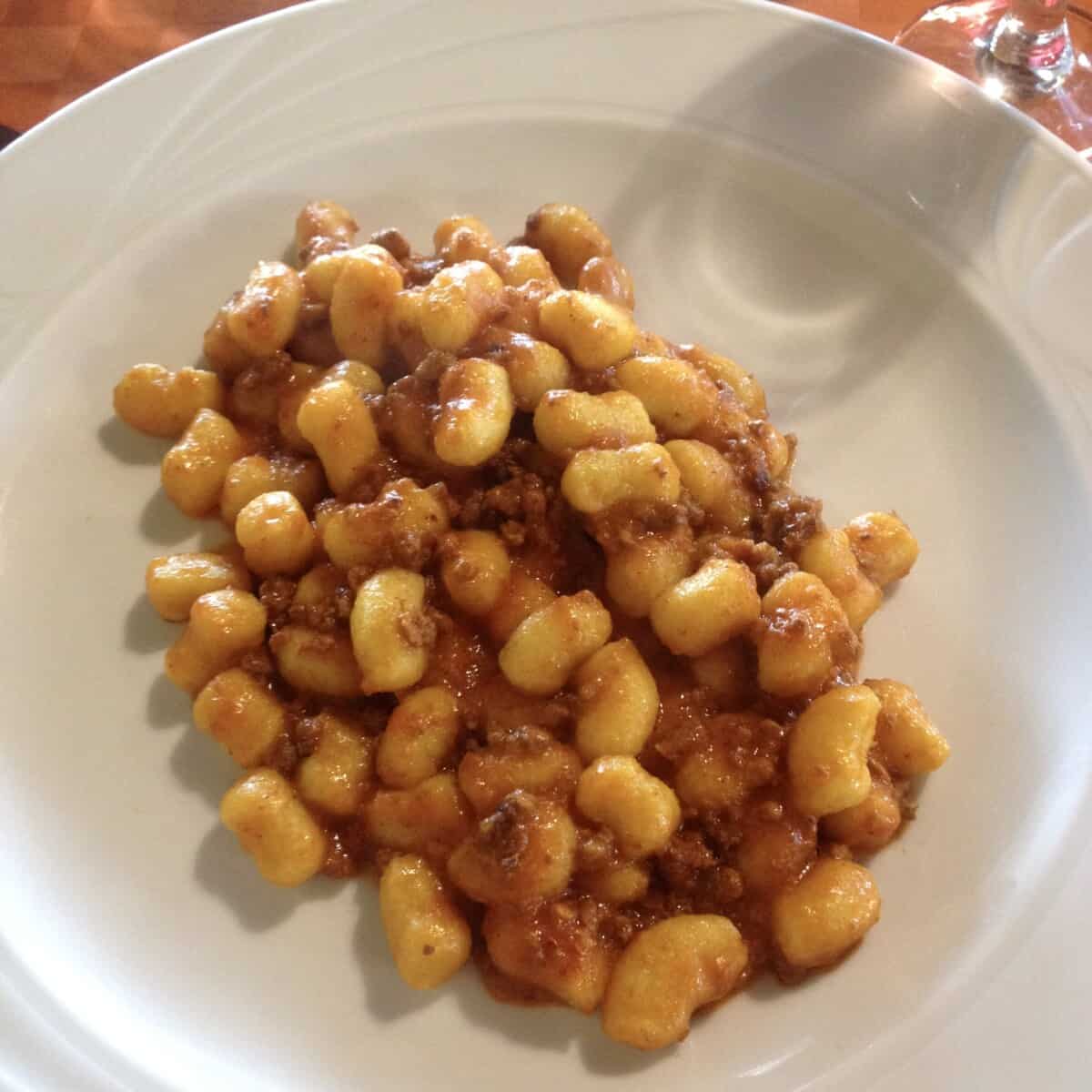 Gnocchi with ragù ordered from one of our regular Italian restaurants in the up the hills from us in NE Italy.
