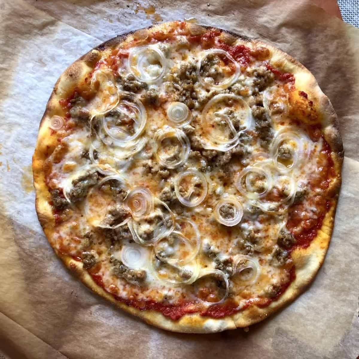 
Freshly baked crispy sausage pizza made with a homemade pizza crust recipe using bread flour, pizza dough recipe for the best homemade pizza dough you can make from scratch.
