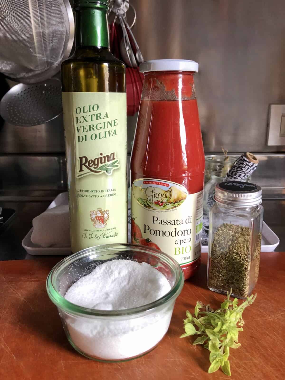 Pizza sauce ingredients on a cutting board.
