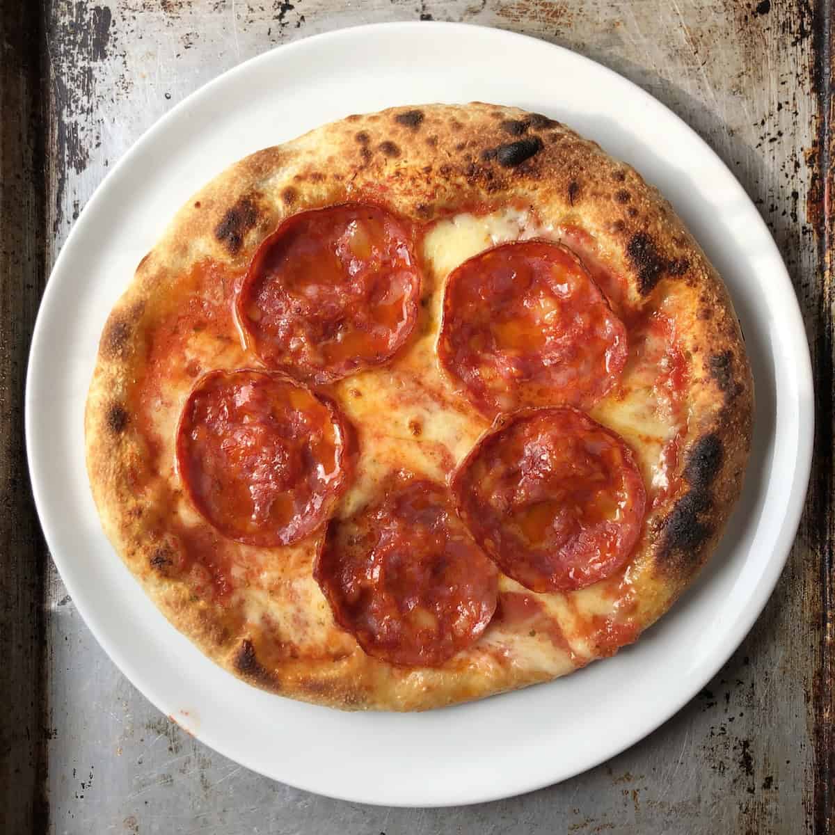 How to make thick crust pizza with ventricina and fresh mozzarella baked golden brown, thick crust pizza dough for a light pizza crust with chewy interior.