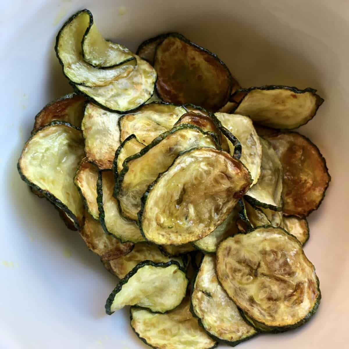 Thin slices of lightly fried zucchini for paccheri pasta.
