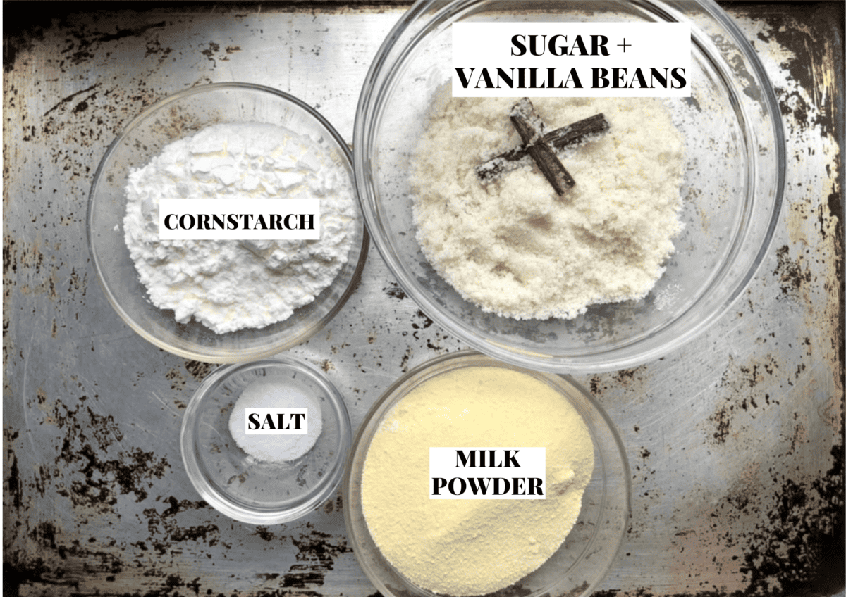 eggless vanilla pudding ingredients on a sheet pan.