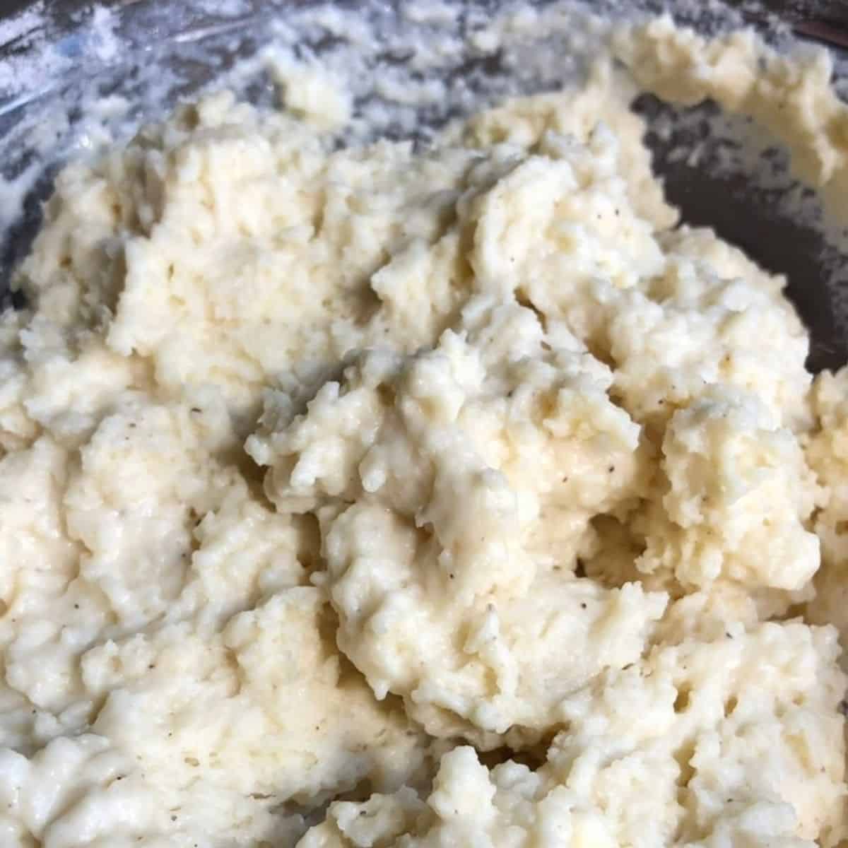 Dumpling batter mixed just until combined showing how to make dumplings for chicken and dumplings from scratch.