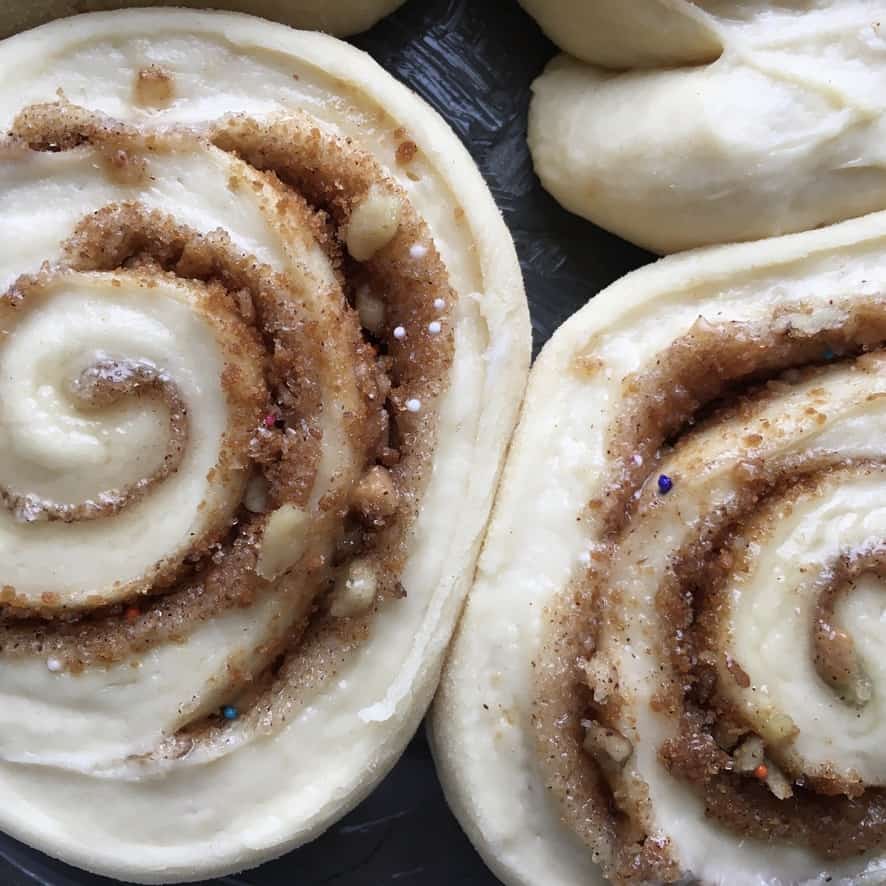 Unbaked Cinnamon Rolls risen and ready to bake.