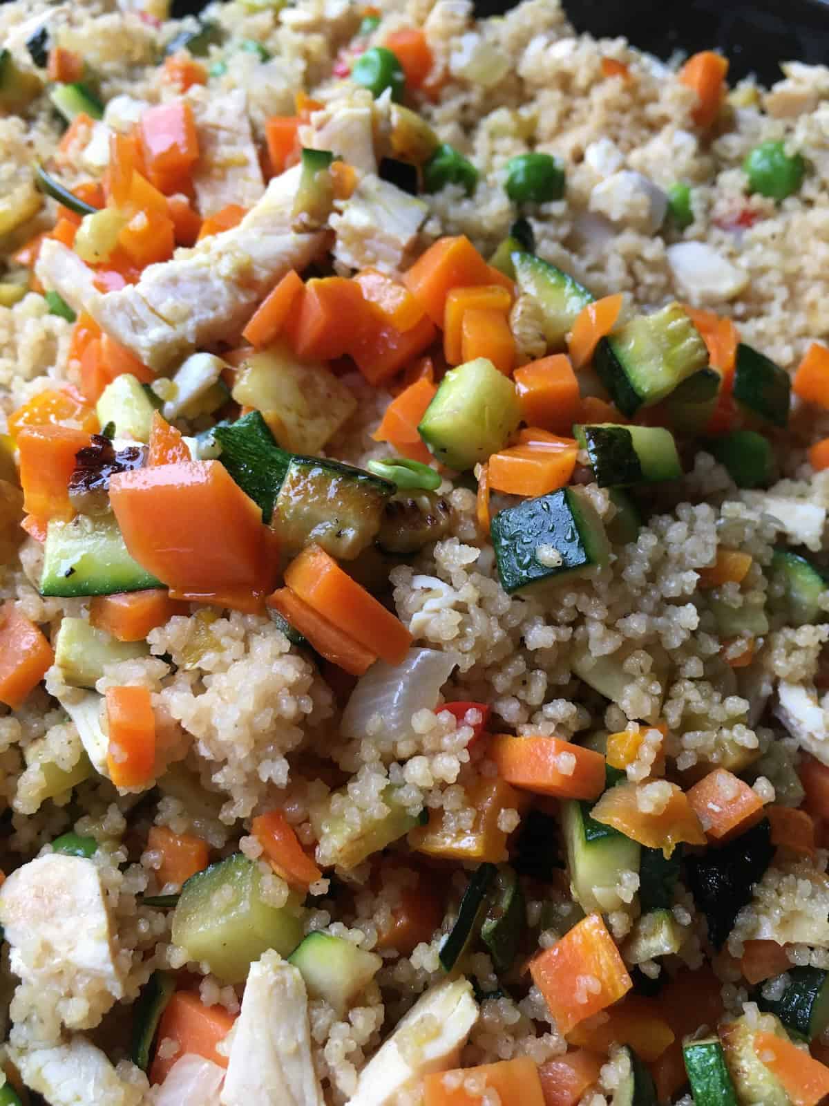 Early test batch of chicken and vegetable couscous that was good but lacked the authentic flavor of artisanal Italian Mediterranean couscous, showing the recipe development process before perfecting the technique of separately caramelizing vegetables and properly seasoning with herbs.