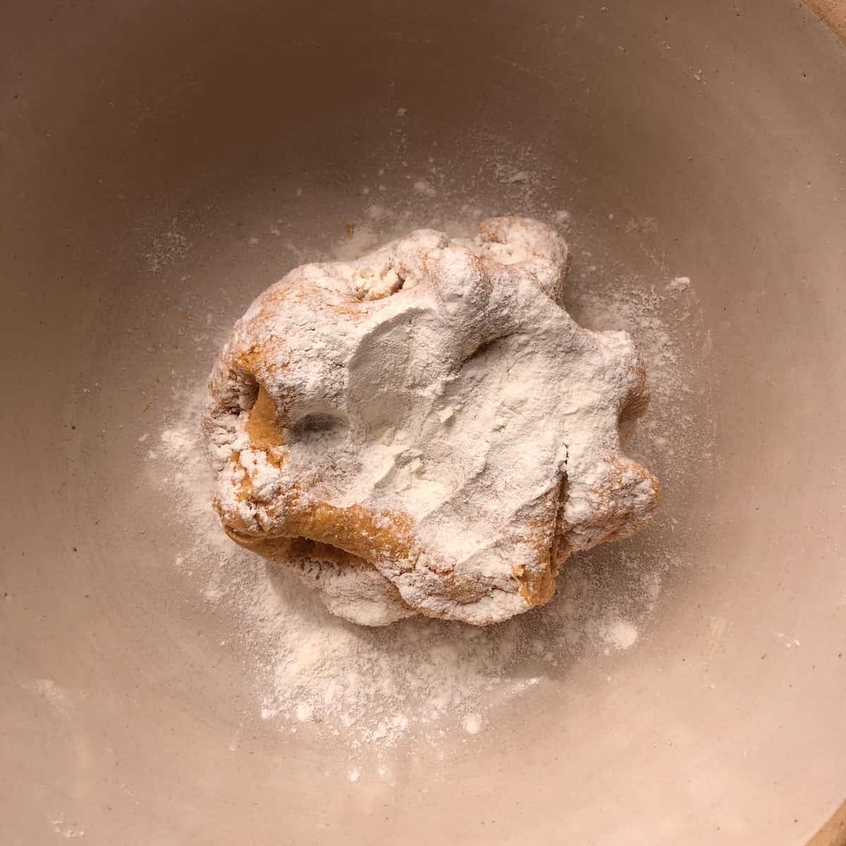 Extra flour sprinkled over the slightly sticky pumpkin pasta dough and to prep it for kneading without sticking to your hands.