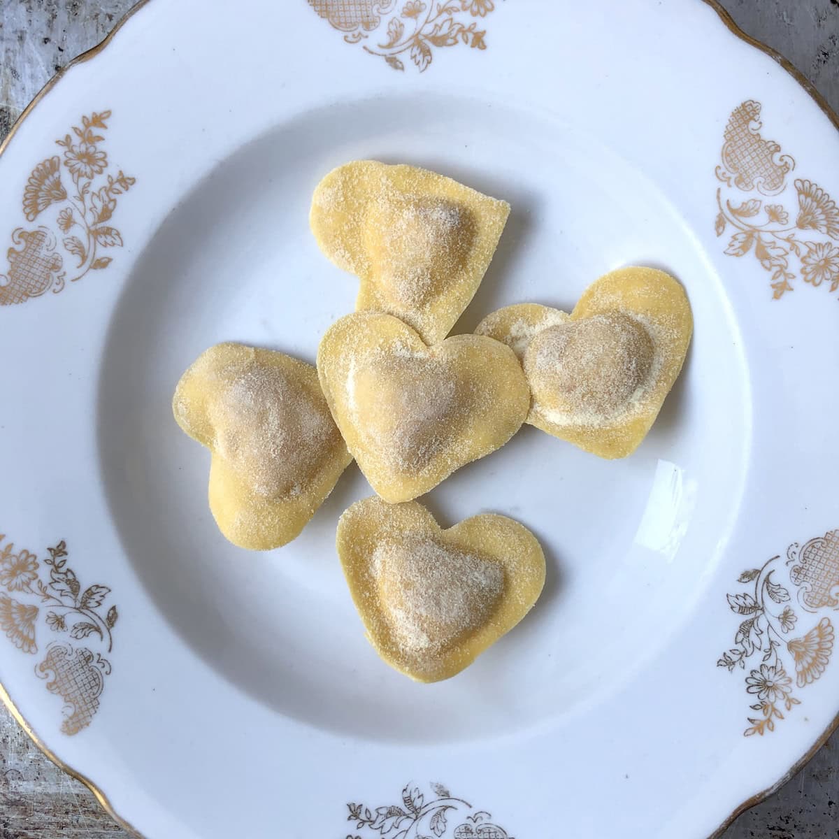 Fully frozen homemade lobster ravioli showing how to meal prep ravioli for dinner parties or easy weeknight dinners.