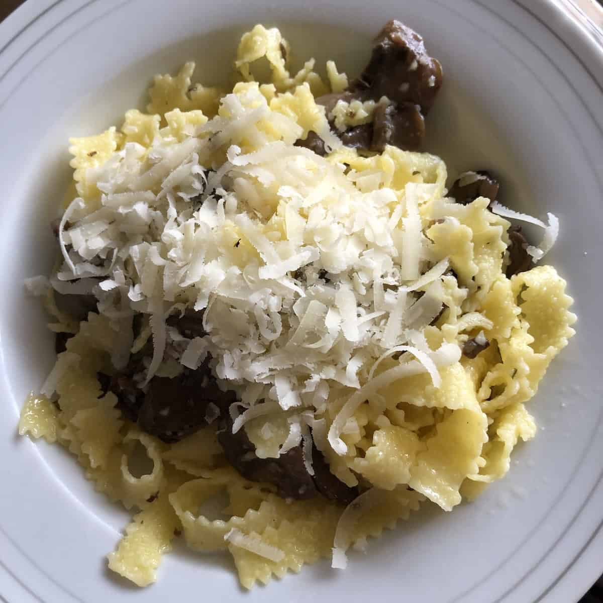 A pasta bowl filled with Nonna Anna's authentic Italian mushroom pasta ai funghi, made the traditional way without cream.

