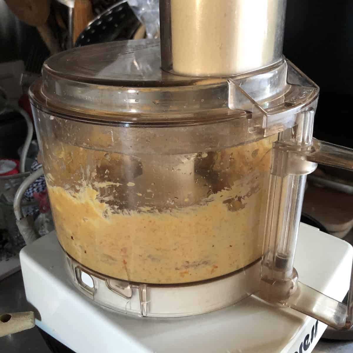 Completely pureed shrimp mousse in food processor for homemade lobster and shrimp ravioli filling.
