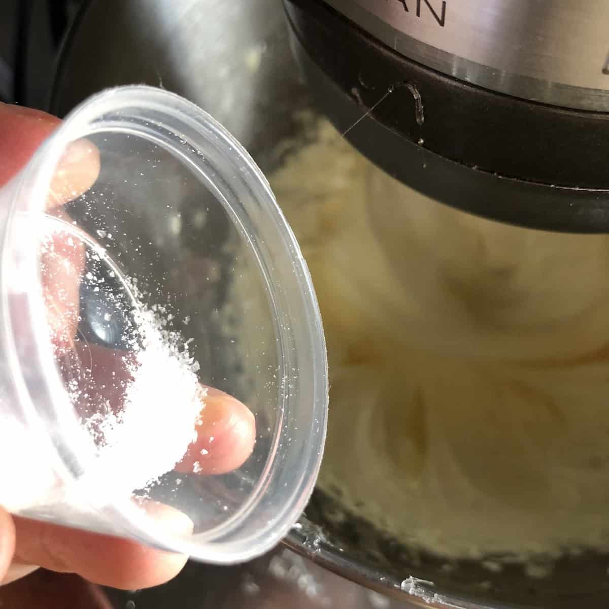 Adding a pinch of salt to the whipped egg and sugar syrup mixture for tiramisu cream.

