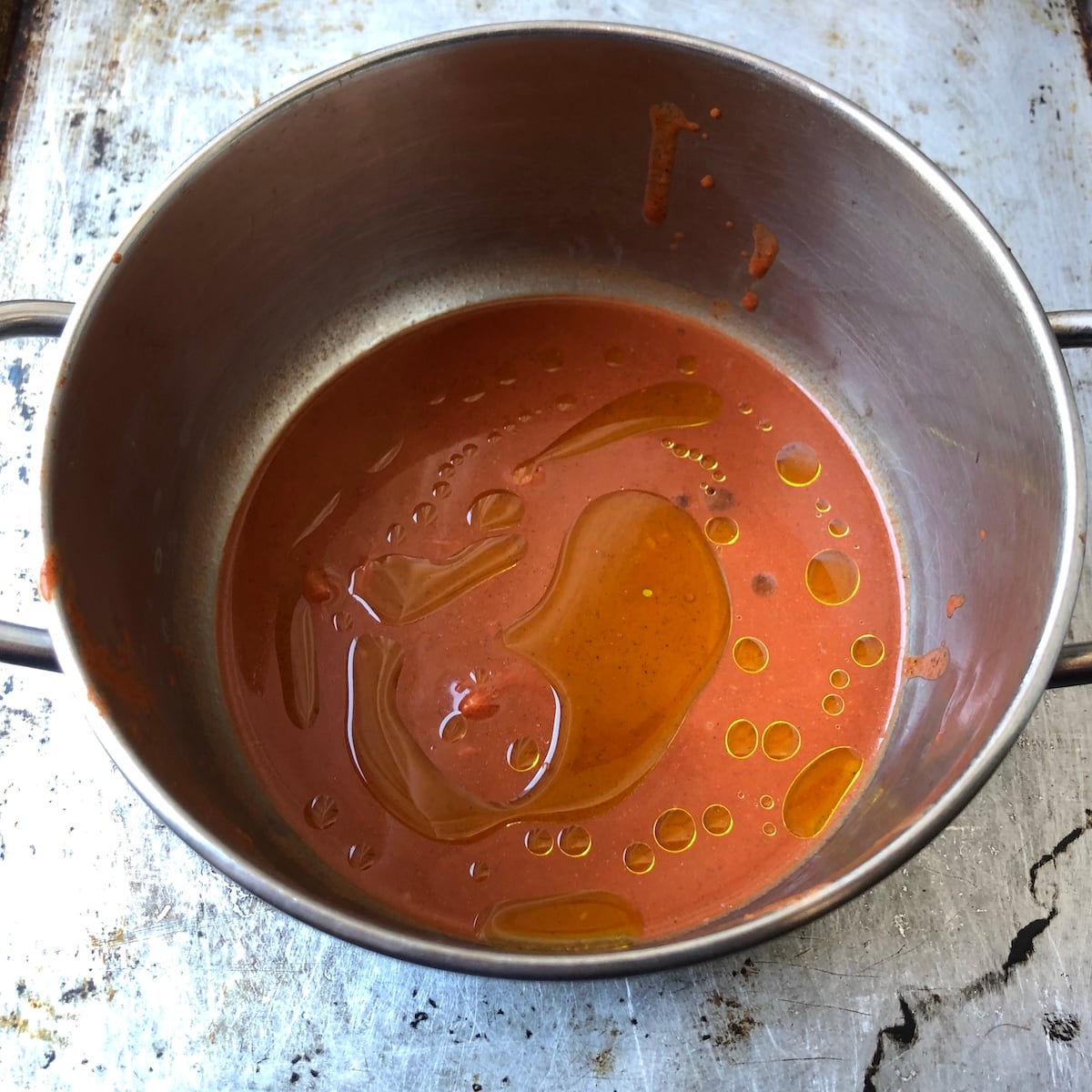 Used pollo asado marinade in a small pot with added olive oil about to be cooked to make it safe to use as a sauce.